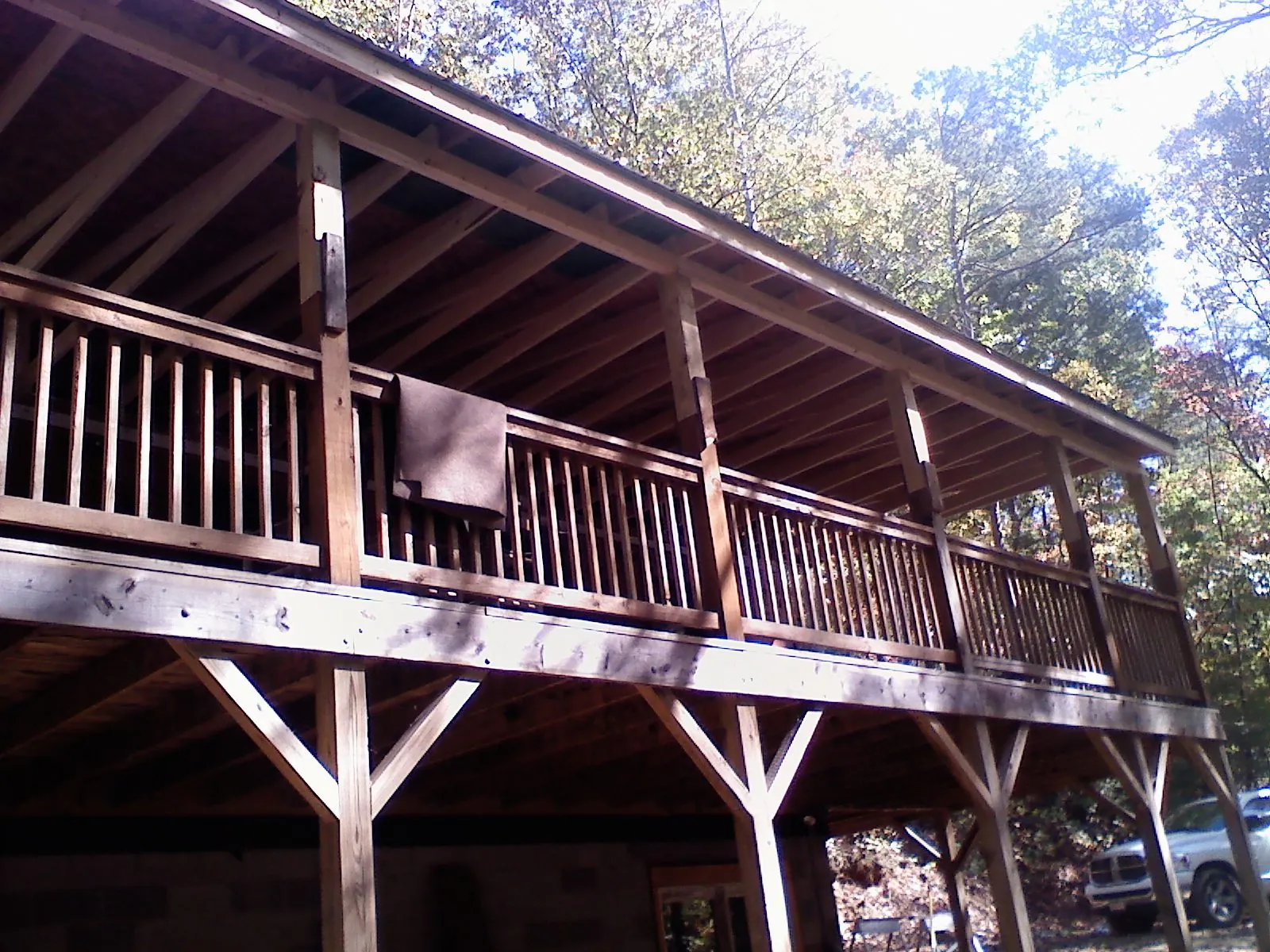 Timber framing under a new elevated porch and deck — Roof Leak Repair in Harwich Port by Roofing Brothers
